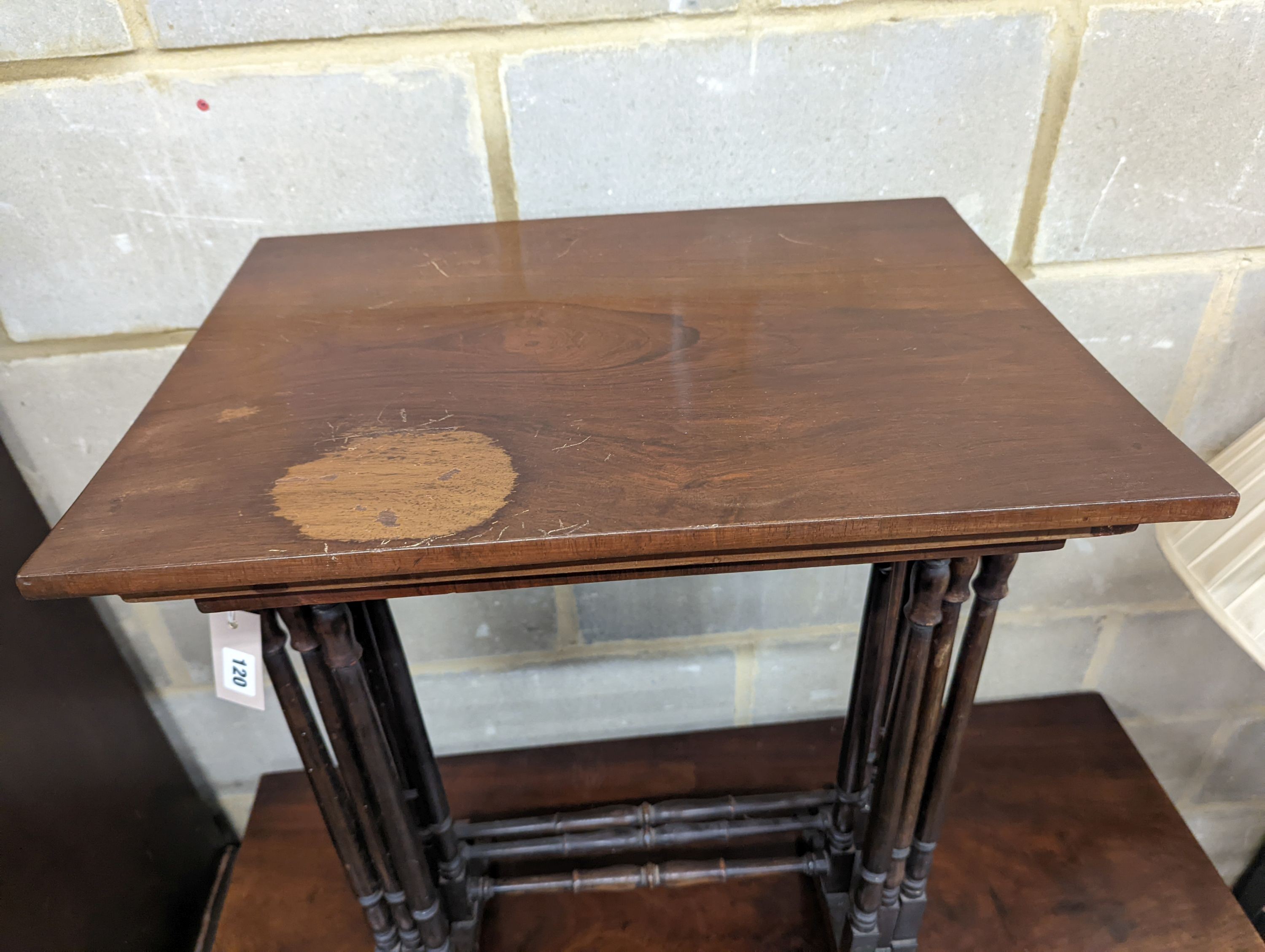 A nest of three Edwardian rectangular mahogany tea tables, width 52cm, depth 38cm, height 71cm